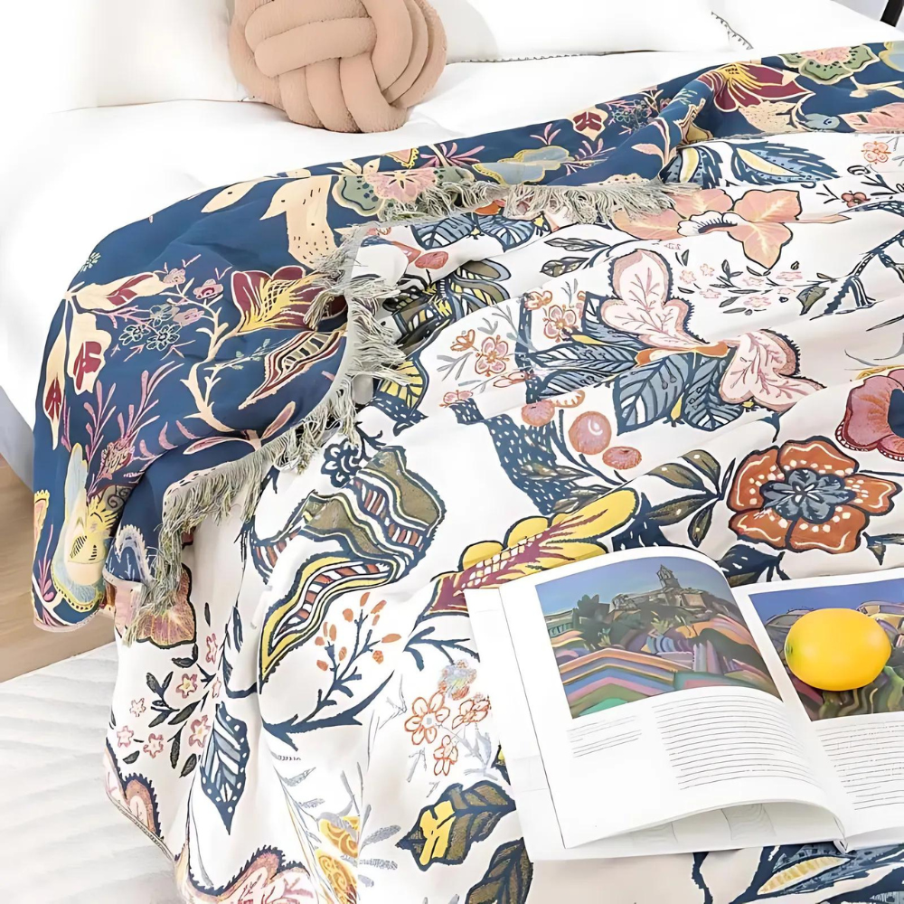 Decorative cotton throw with woven floral pattern and fringes